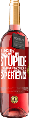 29,95 € Envoi gratuit | Vin rosé Édition ROSÉ Ne discutez jamais avec un stupide. Il vous fera descendre à son niveau et là il vous battra par expérience Étiquette Rouge. Étiquette personnalisable Vin jeune Récolte 2023 Tempranillo