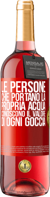 29,95 € Spedizione Gratuita | Vino rosato Edizione ROSÉ Le persone che portano la propria acqua, conoscono il valore di ogni goccia Etichetta Rossa. Etichetta personalizzabile Vino giovane Raccogliere 2023 Tempranillo