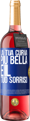 29,95 € Spedizione Gratuita | Vino rosato Edizione ROSÉ La tua curva più bella è il tuo sorriso Etichetta Blu. Etichetta personalizzabile Vino giovane Raccogliere 2024 Tempranillo