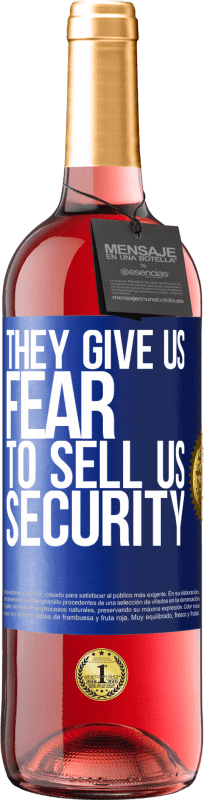 29,95 € Бесплатная доставка | Розовое вино Издание ROSÉ Они дают нам страх, чтобы продать нам безопасность Синяя метка. Настраиваемая этикетка Молодое вино Урожай 2023 Tempranillo