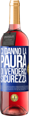 29,95 € Spedizione Gratuita | Vino rosato Edizione ROSÉ Ci danno la paura di venderci sicurezza Etichetta Blu. Etichetta personalizzabile Vino giovane Raccogliere 2025 Tempranillo