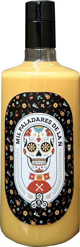 14,95 € Envío gratis | Crema de Licor Mediterranean Mil Paladares de la ñ Crema de Mango Andalucía España Botella 70 cl