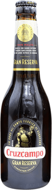 8,95 € Envio grátis | Caixa de 6 unidades Cerveja Cruzcampo Grande Reserva Espanha Garrafa Terço 33 cl