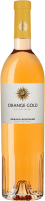18,95 € Бесплатная доставка | Оранжевое вино Gérard Bertrand Gold — Золотая версия Франция Garnacha — Гренаш, Moscato — Мускат, Viognier — Вионье, Chardonnay — Шардоне, Marsanne — Марсанн, Mauzac — Мозак Бутылка 75 cl