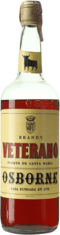 64,95 € Бесплатная доставка | Бренди Osborne Veterano Precinta 4 Pesetas D.O. Jerez-Xérès-Sherry Андалусия Испания Бутылка 1 L Коллекционный экземпляр Не предназначен для употребления