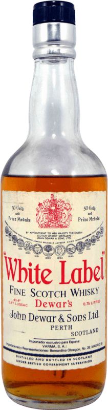 19,95 € Spedizione Gratuita | Whisky Blended Dewar's White Label Varma Esemplare da Collezione anni '70 Regno Unito Bottiglia 75 cl
