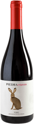 29,95 € Бесплатная доставка | Красное вино Piedra старения D.O. Toro Кастилия-Леон Испания Grenache, Tinta de Toro бутылка 75 cl