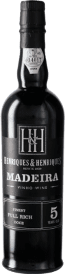22,95 € Spedizione Gratuita | Vino fortificato Justino's Madeira Fine Medium Rich I.G. Madeira Portogallo Negramoll 5 Anni Bottiglia 75 cl