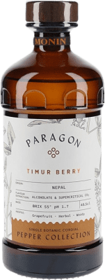 41,95 € Envio grátis | Schnapps Monin Paragon Timur Berry Cordial França Garrafa Medium 50 cl Sem Álcool