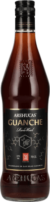 11,95 € Бесплатная доставка | Ром Arehucas Guanche Ron Miel Канарские острова Испания бутылка 70 cl