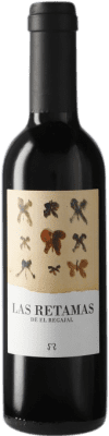 5,95 € Бесплатная доставка | Красное вино El Regajal Las Retamas D.O. Vinos de Madrid Сообщество Мадрида Испания Tempranillo, Merlot, Syrah, Cabernet Sauvignon Половина бутылки 37 cl